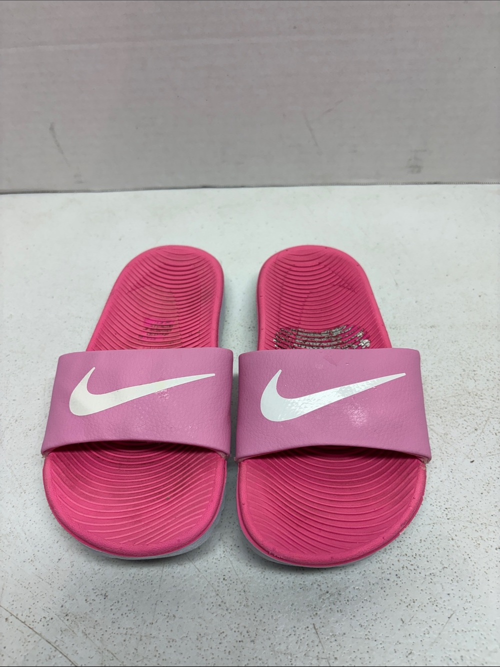 Nike Pink Slide Sandals with White Swoosh Strap
